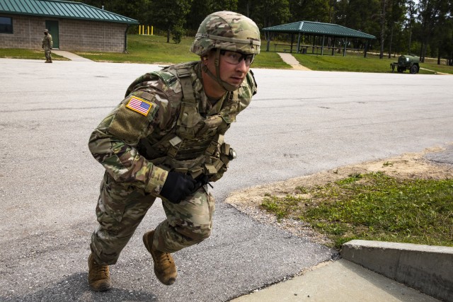 Staff Sgt. Benjamin Latham, a U.S. Army Reserve combat engineer representing the 108th Training Command (Initial Entry Training), moves to a firing position on a machine gun qualification range during the 2020 U.S. Army Reserve Best Warrior...