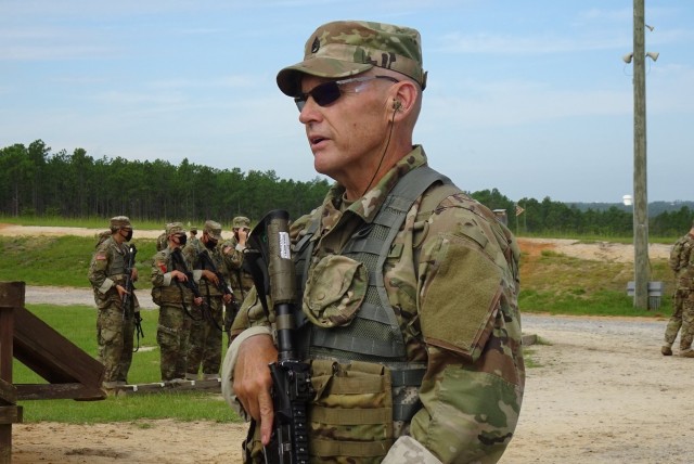 Staff Sgt. Monte Gould walks down the range during training. He recently graduated Basic Combat Training with 1st Battalion, 34th Infantry Regiment.  The 59-year-old recently sat down and spoke about his experiences. (Courtesy Photo)