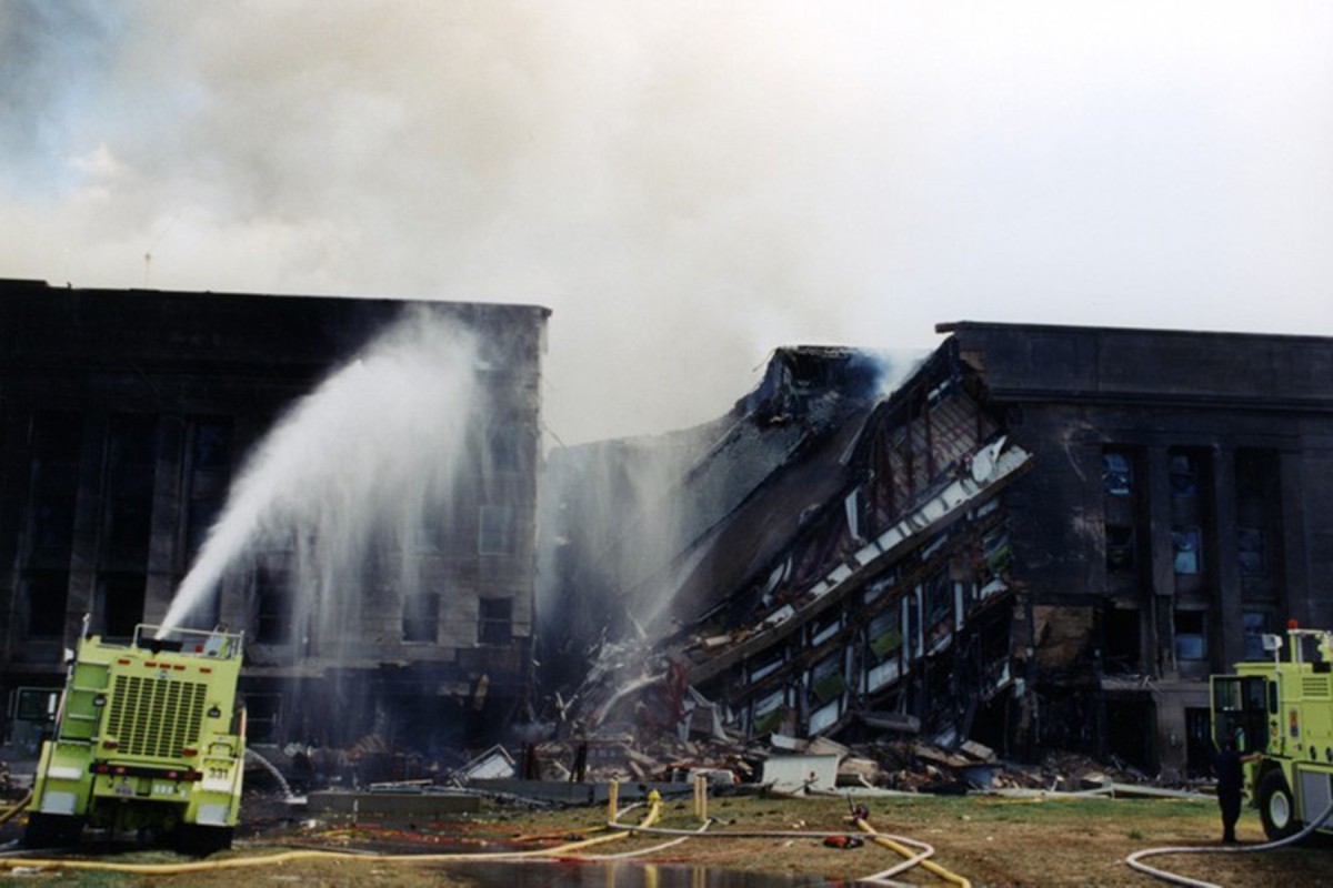 <em>First responders extinguish the fires following the attack on the Pentagon (FBI)</em>
