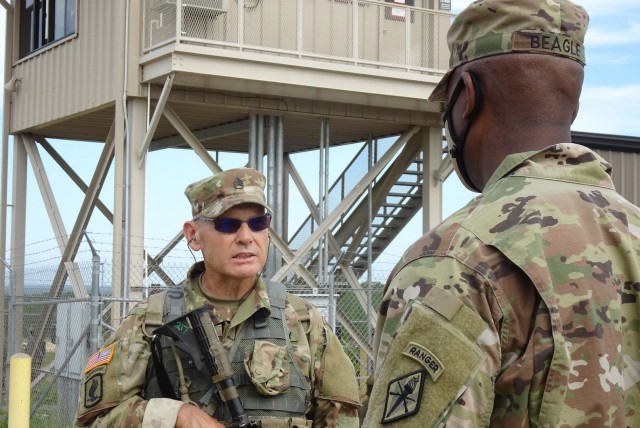 Staff Sgt. Monte Gould, a 59-year-old graduate of Basic Combat Training speaks with Brig. Gen. Milford H. ‘Beags’ Beagle Jr., Fort Jackson’s commander during
...