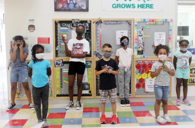 Participants in “Letters Across the Pacific” pose for a photo at the School Age Center at the Sagamihara Family Housing Area, Japan, Sept. 9. Letters Across the Pacific is an initiative to celebrate the Month of the Military Child where...