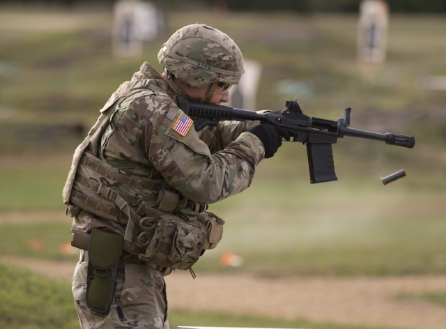 Staff Sgt. Benjamin Latham, a U.S. Reserve combat engineer, representing the 108th Training Command (Initial Entry Training), participates in a three-gun transition range that includes the M26 shotgun, M4 carbine and M17 pistol during the 2020 U.S. Army Reserve Best Warrior Competition at Fort McCoy, Wisconsin, Sept. 7. Forty-four Soldiers from across the nation travelled to compete in this year’s Best Warrior, hosted from Sept. 4-10, 2020. The 2020 BWC is an annual competition that brings in the best Soldiers across the U.S. Army Reserve to earn the title of “Best Warrior” among their peers. Competitors are evaluated on their individual ability to adapt and overcome challenging scenarios and battle-focused events, which test their technical and tactical abilities under stress and extreme fatigue. (U.S. Army Reserve photo by Spc. Zachary Johnson)
