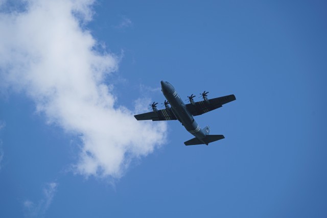 An Air Force C-130J, with the 37th Airlift Squadron, Ramstein Air Base, Germany, flies over Vaziani Training Area, Georgia, as U.S. Army paratroopers assigned to the 173rd Airborne Brigade, prepare for an airborne operation during Noble Partner 20 Sept. 1, 2020. Exercise Noble Partner is designed to enhance regional partnerships and increase U.S. force readiness and interoperability in a realistic, multinational training environment. The exercise allows participants to conduct airborne operations, situational training exercises, live-fire exercises and combined mechanized maneuvers.