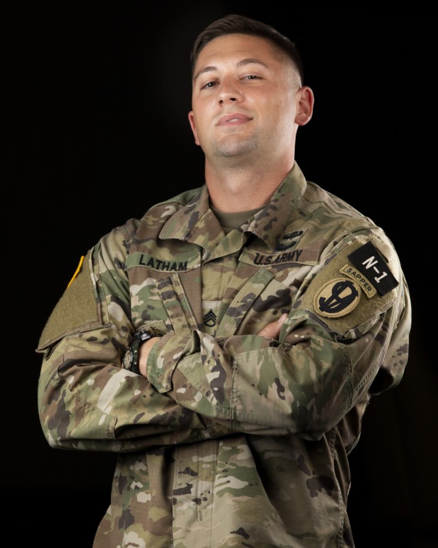 Staff Sgt. Benjamin Latham, a U.S. Reserve combat engineer, representing the 108th Training Command (Initial Entry Training), poses for portraits during the 2020 U.S. Army Reserve Best Warrior Competition on Sept. 5, at Fort McCoy, Wisconsin. Approximately 50 Soldiers from across the nation traveled to compete in this year’s Best Warrior, hosted from Sept. 4-10, 2020. The 2020 BWC is an annual competition that brings in the best Soldiers across the U.S. Army Reserve to earn the title of “Best Warrior” among their peers. Competitors are evaluated on their individual ability to adapt and overcome challenging scenarios and battle-focused events, which test their technical and tactical abilities under stress and extreme fatigue. (U.S. Army Reserve photo by Spc. Jamaal Turner)