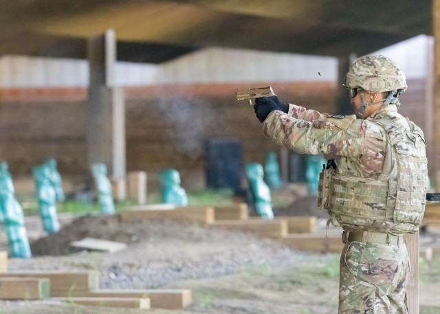 Spc. Hwui Yoo, a language analyst assigned to the 719th Military Intelligence Battalion, 501st MI Brigade, fires an M17 service pistol at the firing range on U.S. Army Garrison Humphreys, South Korea Aug. 24, 2020. Yoo, a native of Rochester...