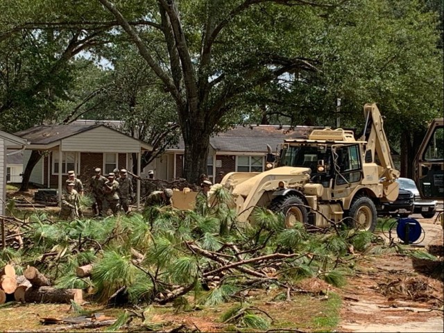Volunteers pitched in to remove debris left in Hurricane Laura’s wake on Fort Polk.