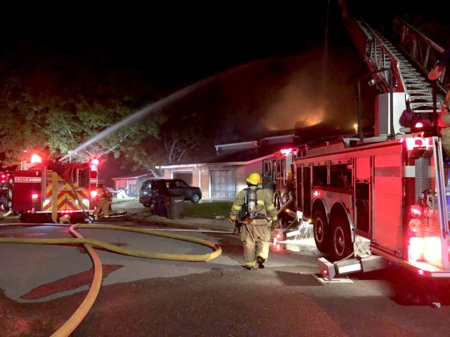 Directorate of Emergency Services firefighters battle a blaze in the Fort Polk housing area Sept. 7.