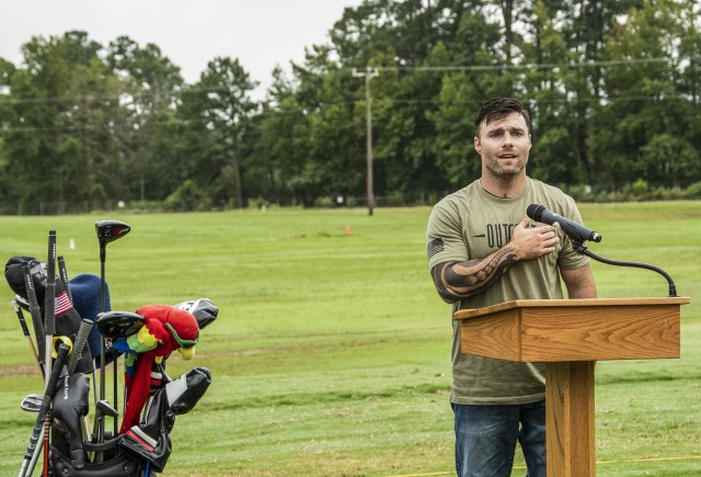 JP Lane, a U.S. Army veteran, performer, and double amputee, sings the National Anthem prior to T-off at a morale building golf scramble held at Fort Eustis, Va., Sept. 11, 2020. (U.S. Army photo by David Overson)