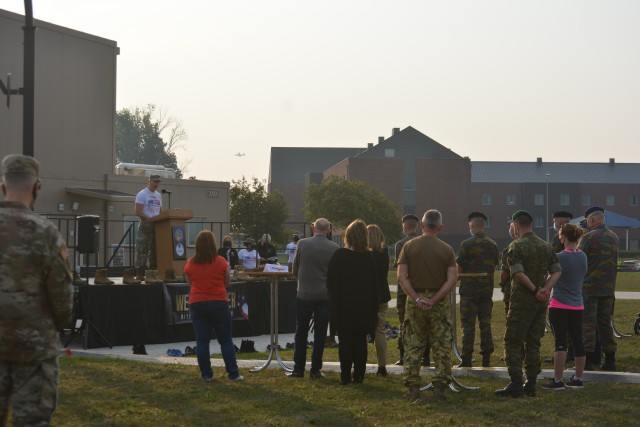 CHIÈVRES, Belgium – Col. James Yastrzemsky, left, U.S. Army Garrison Benelux commander, delivers remarks at the 9/11 remembrance event. At three of its locations in two of its host nations, USAG Benelux observed the 19th anniversary of 9/11...