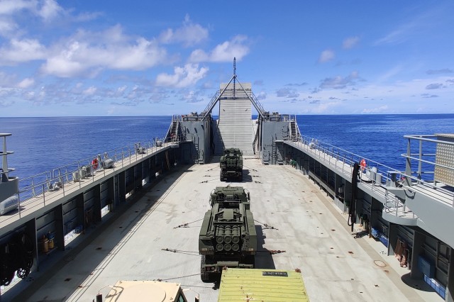 U.S. Army High Mobility Artillery Rocket Systems from the 17th Field Artillery Brigade travel from Guam to Palau on the logistic support vessel LTG William B. Bunker (LSV-4), Sept. 5. The 8th Theater Sustainment Command used LSV-4 to practice force projection and expeditionary sustainment as part of Defender Pacific 20, a joint exercise that demonstrates strategic readiness by deploying combat credible forces across the Indo-Pacific Theater of operations. &#34;The LSVs provide critical movement and maneuver capabilities in support of the joint force,&#34; said Maj. Gen. David Wilson, commanding general, 8th Theater Sustainment Command, &#34;which is critical for theater opening, distribution and sustainment in support of the [Theater Joint Force Land Component Commander] and Joint Force Commander.&#34;
(U.S. Army Photo by Sgt. Amron J. Hendley, 163rd Transportation Detachment (LSV-4), Communications NCOIC.)