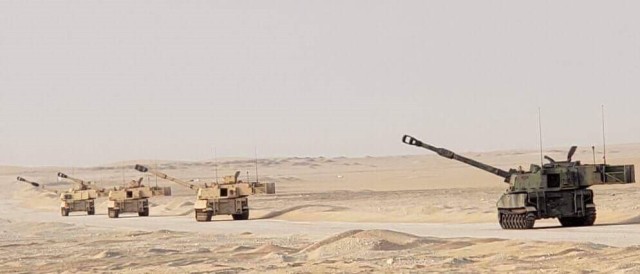 Battery C, 1st Battalion, 161st Field Artillery Regiment, 130th Field Artillery Brigade Artillery, Kansas Army National Guard out of Newton, Kansas, conducts an emergency fire mission while in route to the next training area at Camp Buehring,...