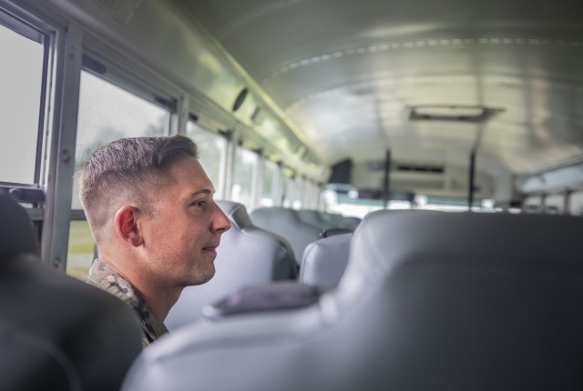 Staff Sgt. Benjamin Latham, a U.S. Army Reserve combat engineer representing the 108th Training Command (Initial Entry Training), waits on a bus during the 2020 U.S. Army Reserve Best Warrior Competition on Sept. 9, at Fort McCoy, Wisconsin. Approximately 50 Soldiers from across the nation travelled to compete in this year’s Best Warrior, hosted from Sept. 4-10, 2020. The 2020 BWC is an annual competition that brings in the best Soldiers across the U.S. Army Reserve to earn the title of “Best Warrior” among their peers. Competitors are evaluated on their individual ability to adapt and overcome challenging scenarios and battle-focused events, which test their technical and tactical abilities under stress and extreme fatigue. (U.S. Army Reserve photo by Spc. Zachary Johnson)