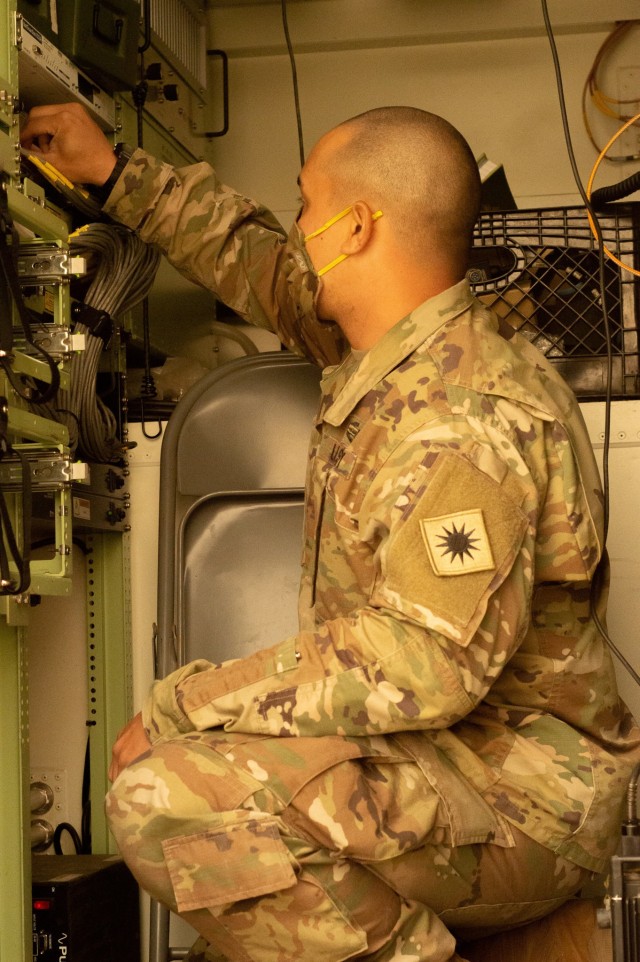 U.S. Army Sgt. Randle Enders, assigned to Cal Guard’s 40th Infantry Division checks radios for connection for mission use at Camp San Luis Obispo, California, Aug. 30, 2020 during Defender Pacific 20. The ability to rapidly surge combat-ready forces into and across the theater is critical in projecting forces at a moment’s notice to support regional alliances and the existing security architecture. (Courtesy photo by U.S. Army National Guard Sgt. Cleo Stitz)