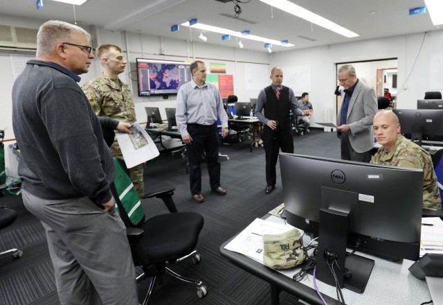U.S. Army Garrison Japan officials work in the Emergency Operations Center in Building 102 on Camp Zama, Japan, March 26.
