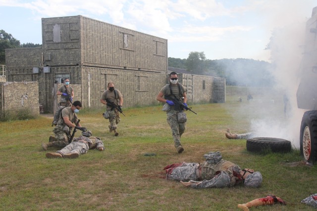 Members of the 807th Medical Command of Salt Lake City, Utah, rush onto the scene of a training scenario during the unit's 68W (combat medic specialist) refresher training Aug. 21 at Fort McCoy. The refresher training is conducted by Fort McCoy's...