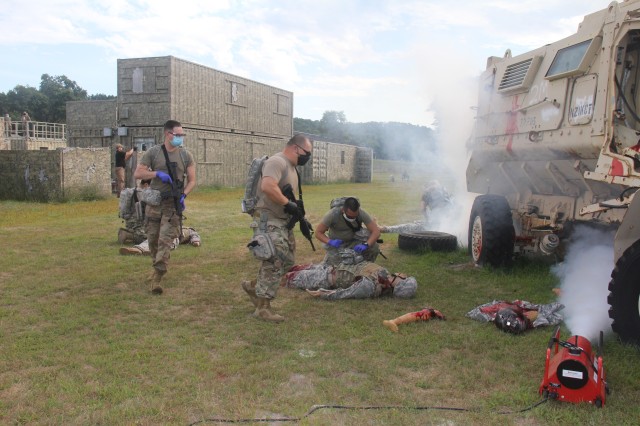 Members of the 807th Medical Command of Salt Lake City, Utah, rush onto the scene of a training scenario during the unit's 68W (combat medic specialist) refresher training Aug. 21 at Fort McCoy. The refresher training is conducted by Fort McCoy's...