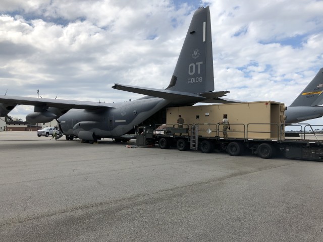 The Negatively Pressurized CONEX Lite system is placed inside an Air Force C-130 Hercules. The system is designed for transporting COVID-19 diagnosed and symptomatic warfighters out of forward installations and on to medical facilities.