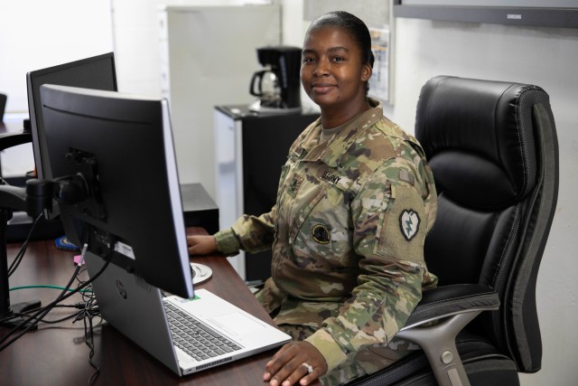 Army Sgt. 1st Class Rachelle White, a senior facilitator at the Noncommissioned Officer Academy Hawaii (NCOA), poses for a photograph at her desk at the NCOA in Mililani, Hawaii, August 20, 2020. White works from her computer as the NCOA has moved...