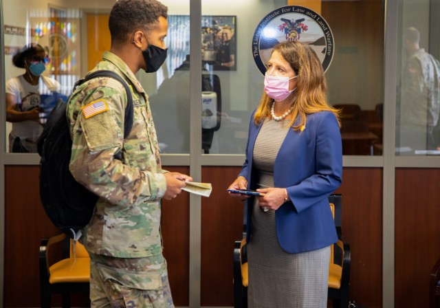 Michele Pearce, right,  the Army&#39;s principal deputy general counsel, speaks with cadets in the Department of Law during her visit to West Point, N.Y., Sept. 8, 2020. If confirmed by the Senate, Pearce will become the first Hispanic-American...