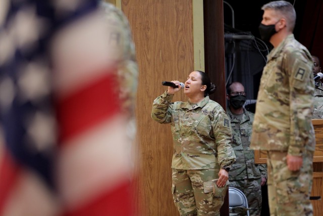 Staff Sgt. Natalie Romero, 5th Armored Brigade, sings the National Anthem during a Transfer of Authority ceremony at Fort Bliss, Texas, September 11, 2020. The 85th U.S. Army Reserve Support Command’s 1st Battalion, 338 Regiment, assumed the...