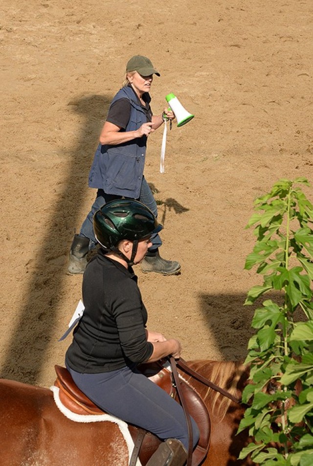 Eight Easy Lessons to Foxhunting instructor Gayle Rue guides riders through basic maneuvers, including walking, trotting and passing other riders, during the first of the Fort Leavenworth Hunt's free pre-season series of classes for riders new or...