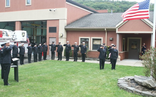 Eighteen current and former members of the West Point Fire Department take part in a memorial ceremony Friday to honor the 343 firefighters, including a former WPFD firefighter Richard “Bruce” Van Hine, who died during the Sept. 11, 2001, terrorist attacks on the Twin Towers in New York City.