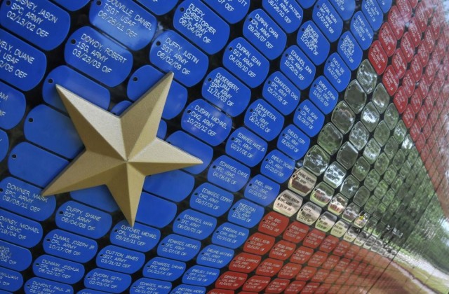 This year's Run for the Fallen featured the American Flag Memorial Wall that was displayed at the Army Community Service Memorial Garden. The exhibit, sponsored by Veterans and Athletes United, is decorated with dog tags adorning the names of the fallen, many of whom died during the Global War on Terrorism.