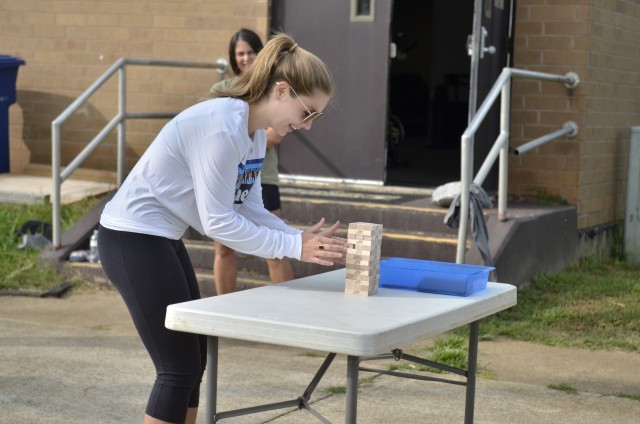 Casey Fallin, Bastogne spouse, participates in a physical resilience activity during the five-week long R2 Bastogne Spouse Boot Camp, Sept 15, at the R2 Performance Center at Fort Campbell. The boot camp is designed to learn resiliency tools in...