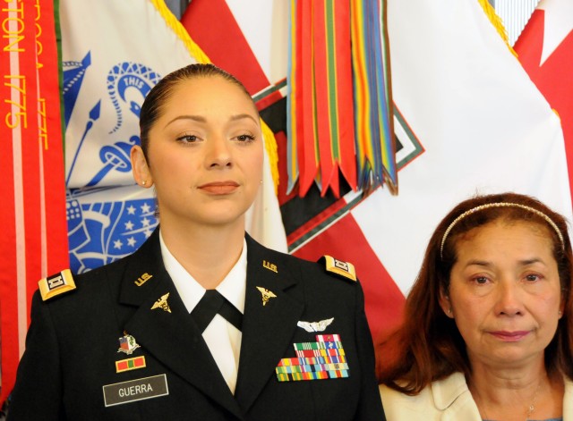 Maj. Kelly Ann Guerra of First Army stands with her mother, Ana Guerra, during Maj. Guerra’s promotion ceremony in First Army headquarters on Rock Island Arsenal, Ill. She has been selected as a 2020 Latina Style, Inc., Distinguished Military Service Award Recipient, which recognizes exemplary conduct and a commitment to military service by Latinas in uniform.