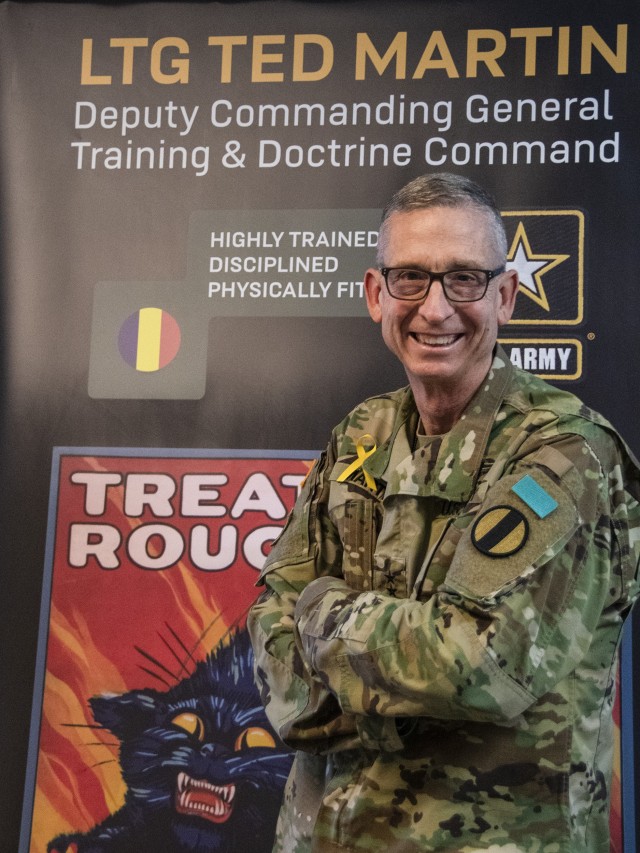 Lt. Gen. Ted Martin, Deputy Commanding General of the U.S. Army Training and Doctrine Command, poses with his SASH (Soldiers Against Sexual Assault / Harassment) tab, along with his yellow ribbon to bring awareness to the SASH program and...