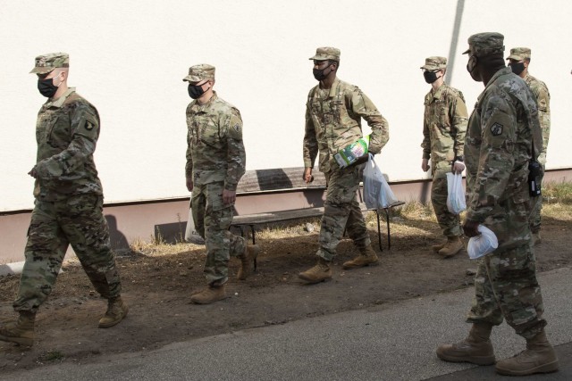 Inbound Soldiers from the United States to Europe, get comfort items from the shoppette then march back to the Deployment Processing Center, Rhine Ordnance Barracks in Kaiserslautern, Germany September 11, 2020. The DPC currently houses incoming...