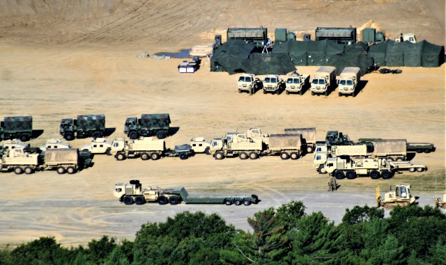 Soldiers with the 123rd Engineer Battalion of the Illinois National Guard operate at a tactical training area Aug. 4, 2020, on North Post at Fort McCoy, Wis. The battalion’s Soldiers were among approximately 4,000 service members training at Fort McCoy during the first week of August 2020. Transient troop training like this resumed at Fort McCoy in July 2020 after being stopped for several months because of the COVID-19 pandemic response. Over months of planning, however, Fort McCoy training officials were able to reopen the training with COVID-19 safety measures built in. Fort McCoy’s motto is to be the “Total Force Training Center.” (U.S. Army Photo by Scott T. Sturkol, Public Affairs Office, Fort McCoy, Wis.)