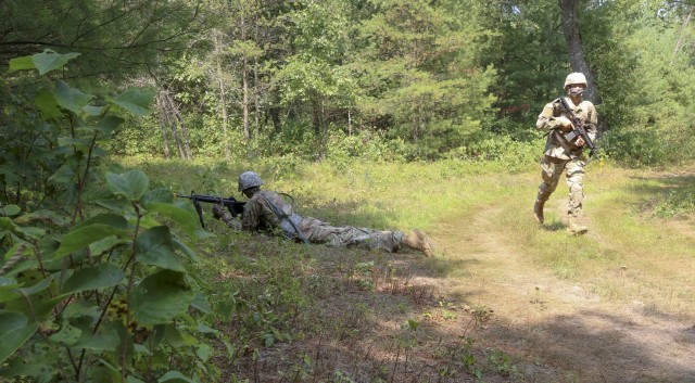 During fire team Army Warrior Task lanes training, Pfc. Alex Stone, 993rd Transportation Medium Truck Company, bounds forward to maneuver around a suspected explosive device as part of Operation Ready Warrior at Fort McCoy, Wis., August 25, 2020. The training is to help train and test U.S. Army Reserve Soldiers on individual and small team skills while following the training guidelines set forth by the Department of Defense.