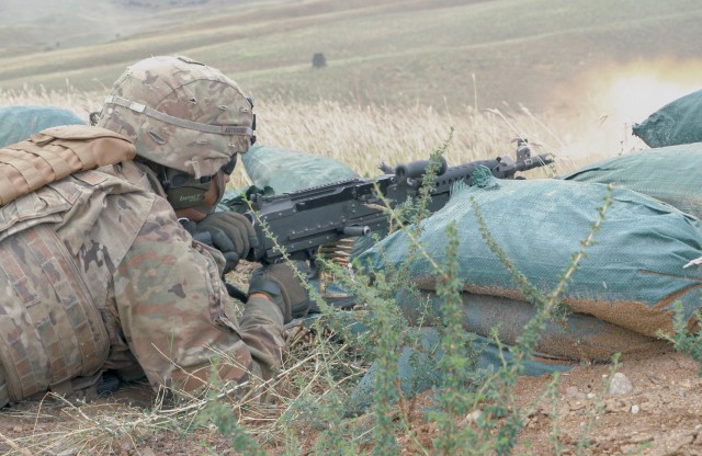 U.S. Soldier, assigned to the 4th Squadron, 2d Cavalry Regiment, fires M240 machine gun during a live-fire training exercise at the Vaziani Training Area in Georgia from September 7th to September 18th. Designed to enhance regional partnerships and increase U.S. force readiness and interoperability, the exercise allows participants to conduct sniper and demo ranges, situational training exercises, live-fire exercises and combined mechanized maneuvers. The 4th Squadron, 2d Cavalry Regiment led the multinational training exercise for the regiment and served with approximately 2,800 service members from Georgia, France, Poland and the United Kingdom. (U.S. Army photo by Sgt. LaShic Patterson)