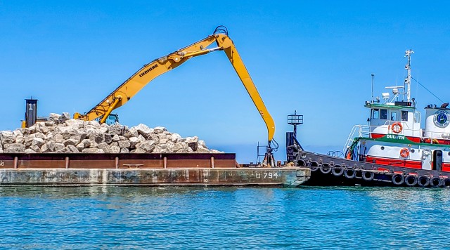 U.S. Army Corps of Engineers Buffalo District contractor Great Lakes Dock and Materials, LLC places armor stone along the Lorain Harbor breakwater's repaired cell, Lorain, OH, July 13, 2020.
...