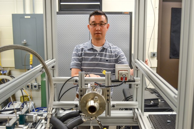 Prof. Tonghun Lee, University of Illinois-Urbana Champaign, demonstrates the Army Research Combustor M1 machine, designed and built at his campus in collaboration with the CCDC Army Research Laboratory. The machine will be used in combustion tests.