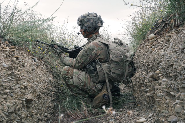 U.S. Soldier, assigned to the 4th Squadron, 2d Cavalry Regiment, takes fire position in trench during a live-fire training exercise at the Vaziani Training Area in Georgia from September 7th to September 18th. Designed to enhance regional partnerships and increase U.S. force readiness and interoperability, the exercise allows participants to conduct sniper and demo ranges, situational training exercises, live-fire exercises and combined mechanized maneuvers. The 4th Squadron, 2d Cavalry Regiment led the multinational training exercise for the regiment and served with approximately 2,800 service members from Georgia, France, Poland and the United Kingdom. (U.S. Army photo by Sgt. LaShic Patterson)