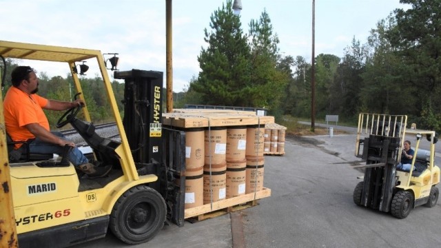 MARID Team members transfer energetics from dock to truck during a recent mission.