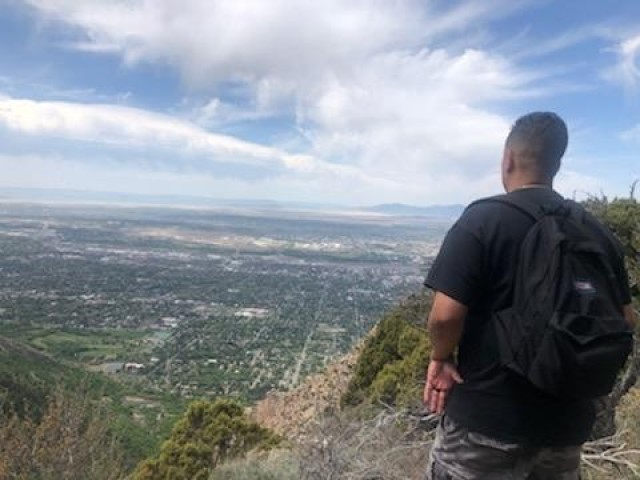 Chief Warrant Officer 2 Oscar Alcala, Headquarters and Headquarters Company, 2nd Space Battalion, 1st Space Brigade, U.S. Army Space and Missile Defense Command, hikes above Salt Lake City, Utah, May 2020. Alcala mobilized with Task Force 76 in...