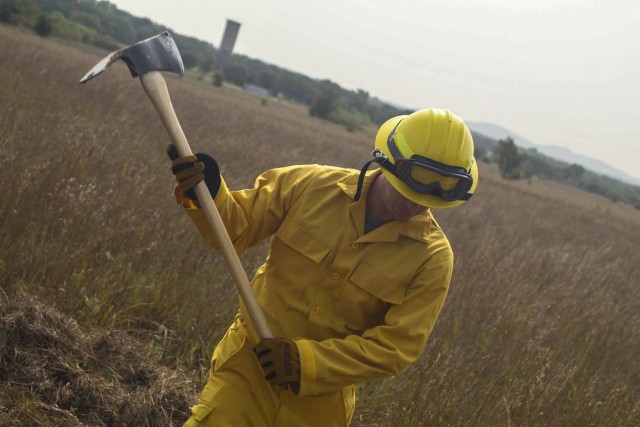 Tech. Sgt. Adam Dixon, client systems administrator with the 184th Wing Communications Flight, from Rose Hill, Kansas, practices constructing a firebreak during the field training day portion of the Wildland Firefighting Red Card Certification Course that took place at the Great Plains Regional Training Center in Salina Sept. 17. The objective of the course, which was made possible through a partnership between the Kansas National Guard and the Kansas Forest Service, was to increase statewide wildland firefighting capabilities by certifying guardsmen across the state to respond to wildland fires.