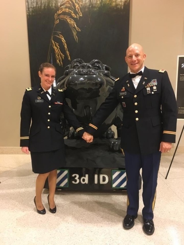 Dr. Kristen Boucher poses with her husband Jeremy Boucher in uniform at a military ball in 2017. Kristen, a Syracuse, New York native, and Jeremy, a Springfield, Massachusetts-native, have both since retired from the Army. The couple opened Split...