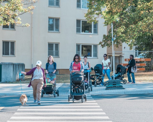 WIESBADEN, Germany – Kellie Webster, home visitation specialist with Army Community Services, leads mothers and their children on the weekly brisk walk around Hainerberg Sept. 23.