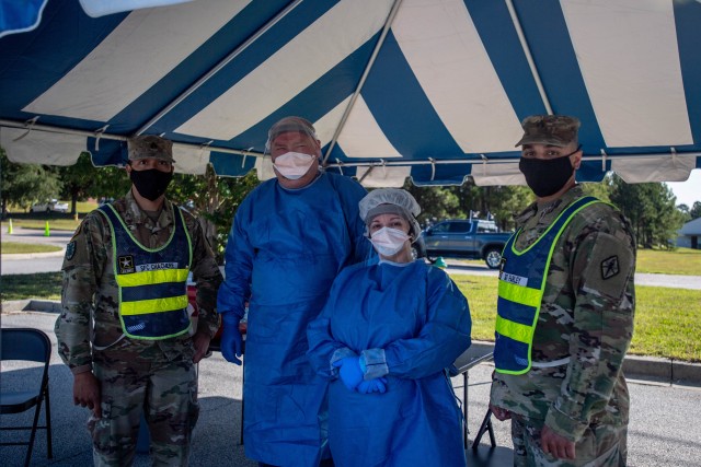 Soldiers and MUSC COVID responders pose for a photo during drive-thru testing Sept. 22.