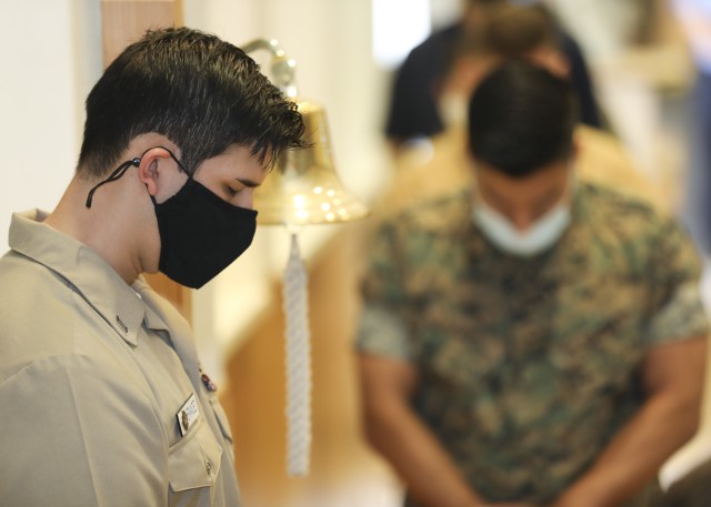 U.S. Navy Seaman Romen Hernandez, a hospital corpsman with the Navy Detachment at Landstuhl Regional Medical Center, prepares to sound a bell in memory of the victims of the 9/11 attacks during Landstuhl Regional Medical Center’s 9/11 Remembrance, Sept. 11.
