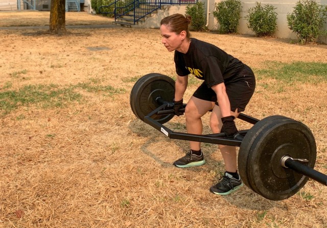 Sgt. 1st Class Erika Acostalozada, an Army Reserve master fitness trainer from the 7305th Medical Training Support Battalion, performing the dead-lift event while leading the Army Combat Fitness Test validation course at B.T. Collins Army Reserve...