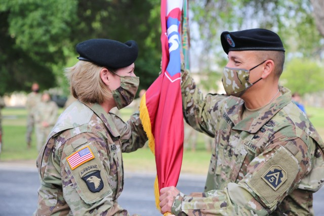 Incoming Command Sgt. Maj., Command Sgt. Maj. Phil K. Barretto, receives the command’s colors from Lt. Gen. Laura J. Richardson, commander, U.S. Army North, in his first official act as the U.S. Army North senior enlisted leader, during a change...