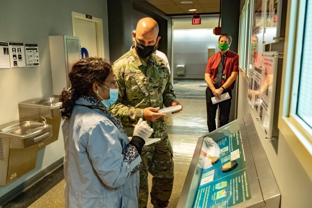 The newest Soldier assigned to the U.S. Army Combat Capabilities Development Command’s Army Research Laboratory, Sgt. Maj. Luke Blum, meets with researchers Sept. 21, 2020, at the Adelphi Laboratory Center, Maryland.