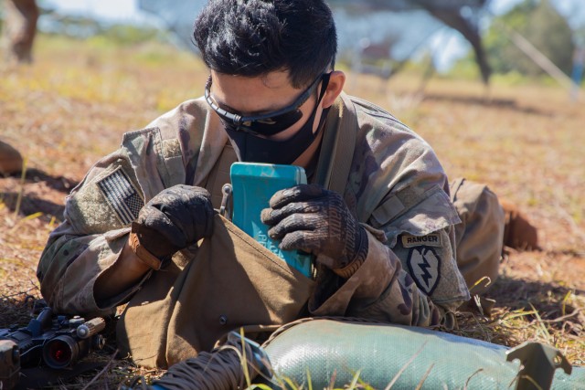 1st Lt. Kevin Yi, an infantry officer assigned to 1st Battalion, 27th Infantry Regiment, 2nd Infantry Brigade Combat Team, 25th Infantry Division prepares to set a M18A1 Claymore Mine during the Expert Infantryman Badge, EIB, testing at Schofield Barracks, Hawaii on Sept. 16, 2020. The EIB was developed in 1943 to recognize Soldiers who show expert proficiency in basic Soldier tasks. (U.S. Army photo by Staff Sgt. Alan Brutus)