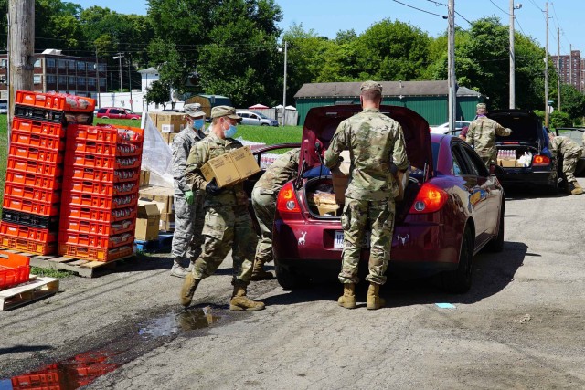 Joint Task Force members load food into civilian vehicles in Springfield, Ohio, Aug. 5, 2020. Since March members of the Ohio National Guard have been assisting at food banks across Ohio.