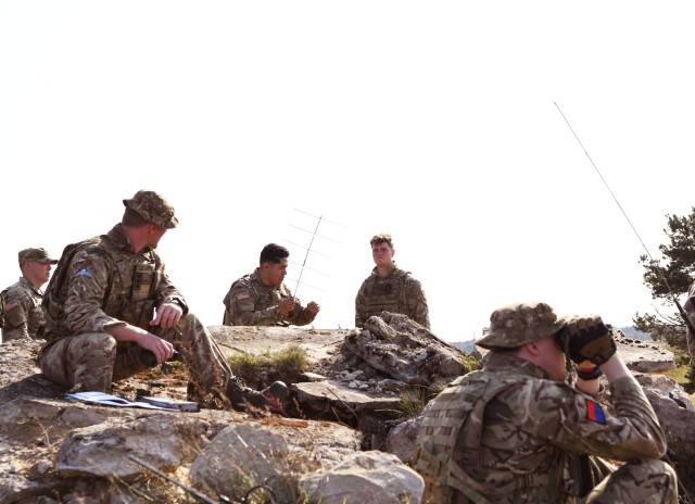 British and American Joint Terminal Attack Controllers setting up observation post for the Wojtek Fire Exercise.